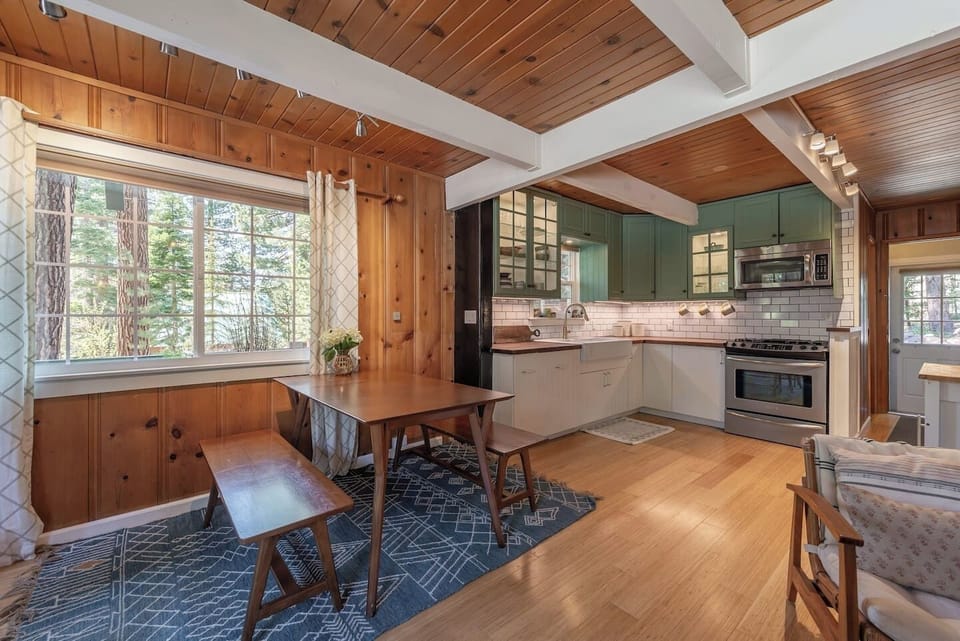 Open concept dining room, kitchen, and living room right as you walk in the front door. 