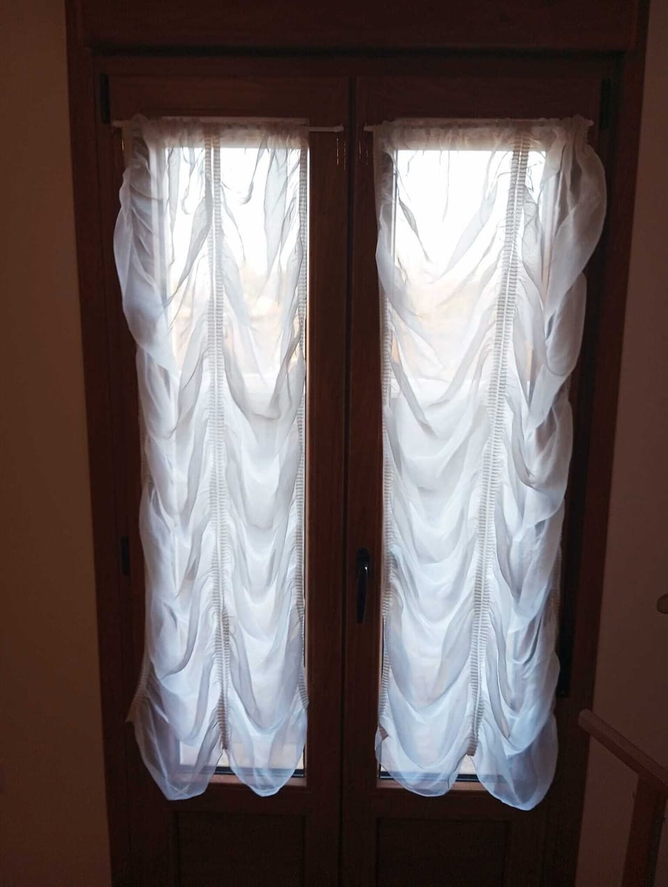 puerta a la terraza privada desde la habitación suite doble con aseo