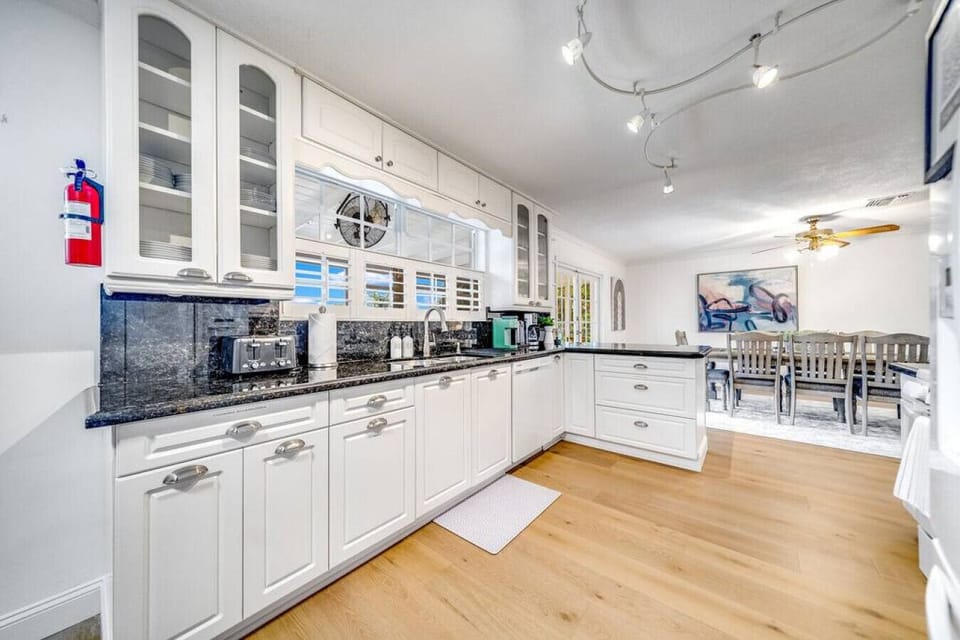 Spacious kitchen with abundant storage and a seamless flow into the dining area.