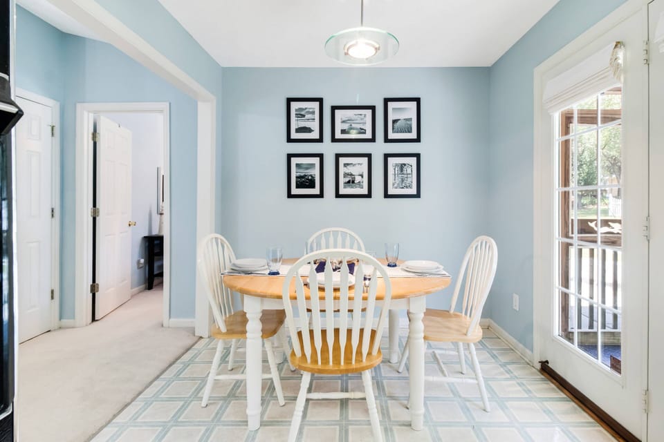 Just off the Dining Area is the Primary Bedroom on the Left.