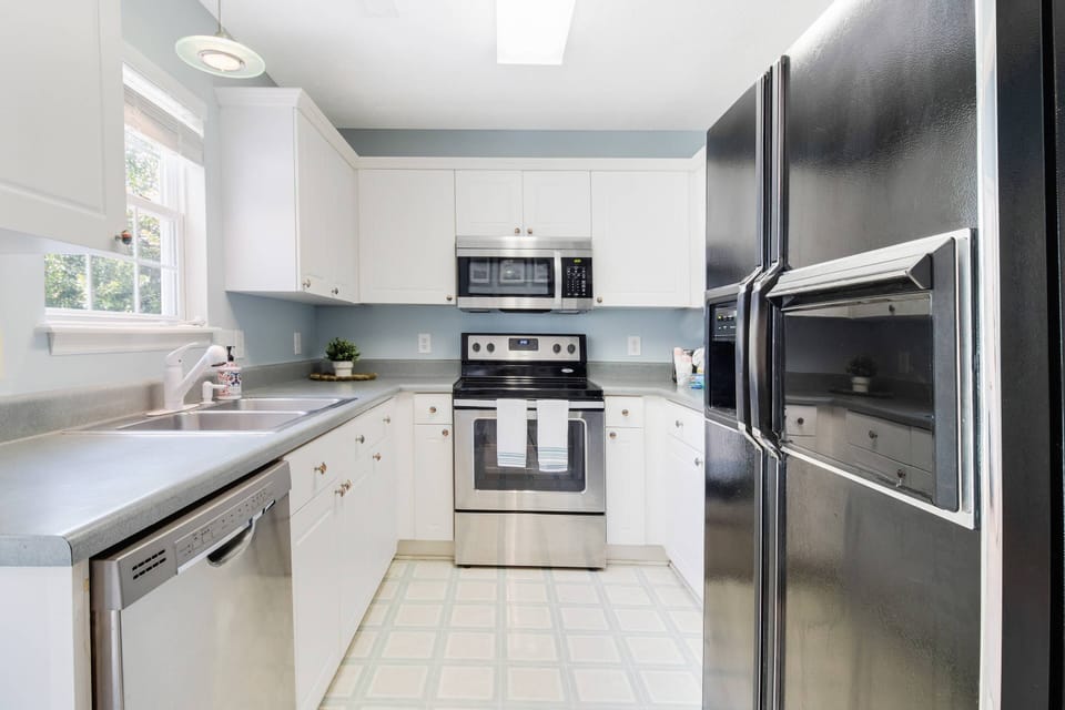 This Galley Kitchen makes everything within reach while you prepare delicious meals.