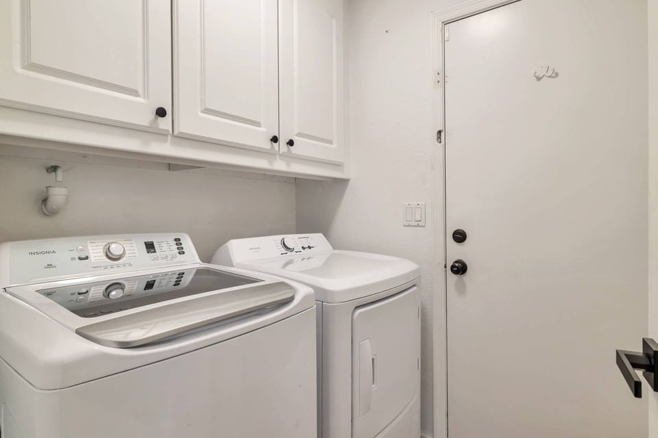 Laundry room with full size washer and dryer