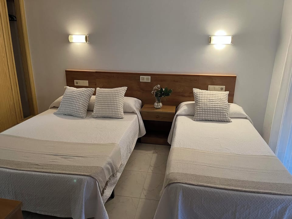 Triple Room | Bed sheets