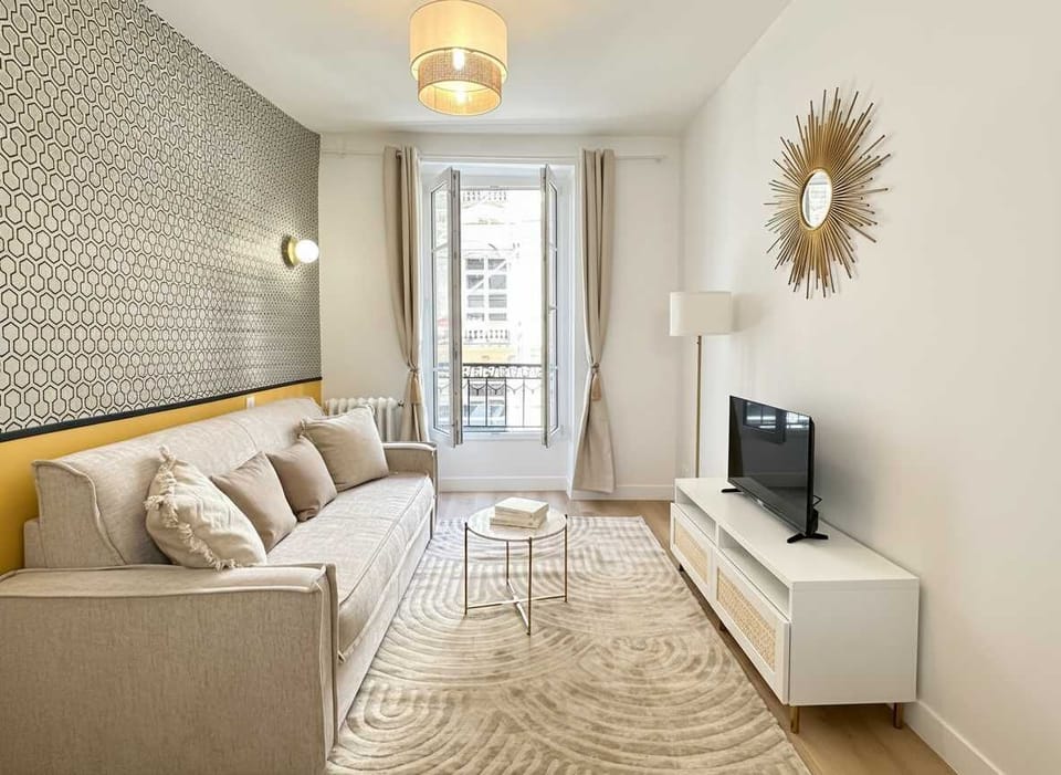 A warm and airy living room with sofa bed
