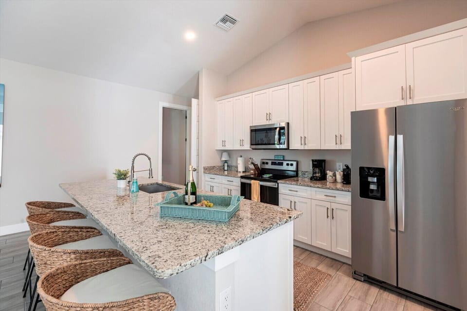 Kitchen Oasis: Modern finishes and spacious countertops for culinary adventures in sunny Bonita Springs!