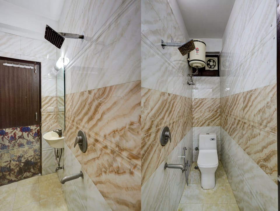 Shower, rainfall showerhead, towels, soap