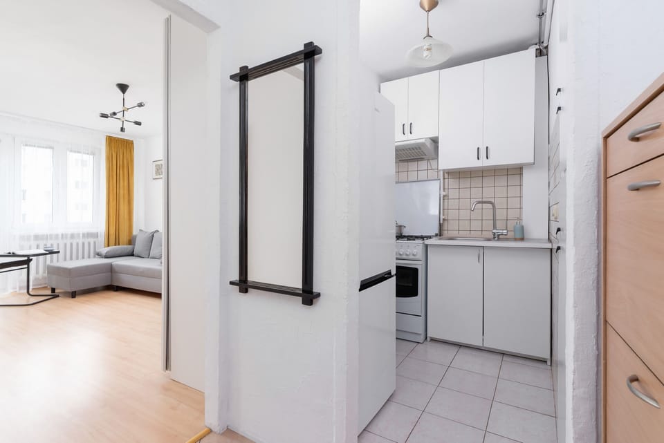 Entryway leading to the kitchen, featuring a clean and practical design.

