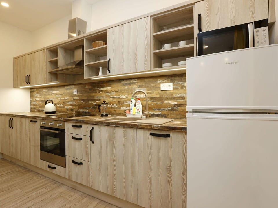 Cabinetry, Property, Countertop, Building, Furniture, Sink, Wood, Kitchen Stove, Drawer, Tap