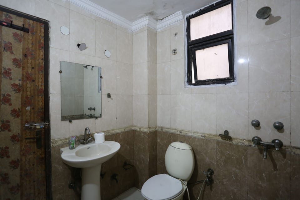 Shower, rainfall showerhead, bathrobes, towels