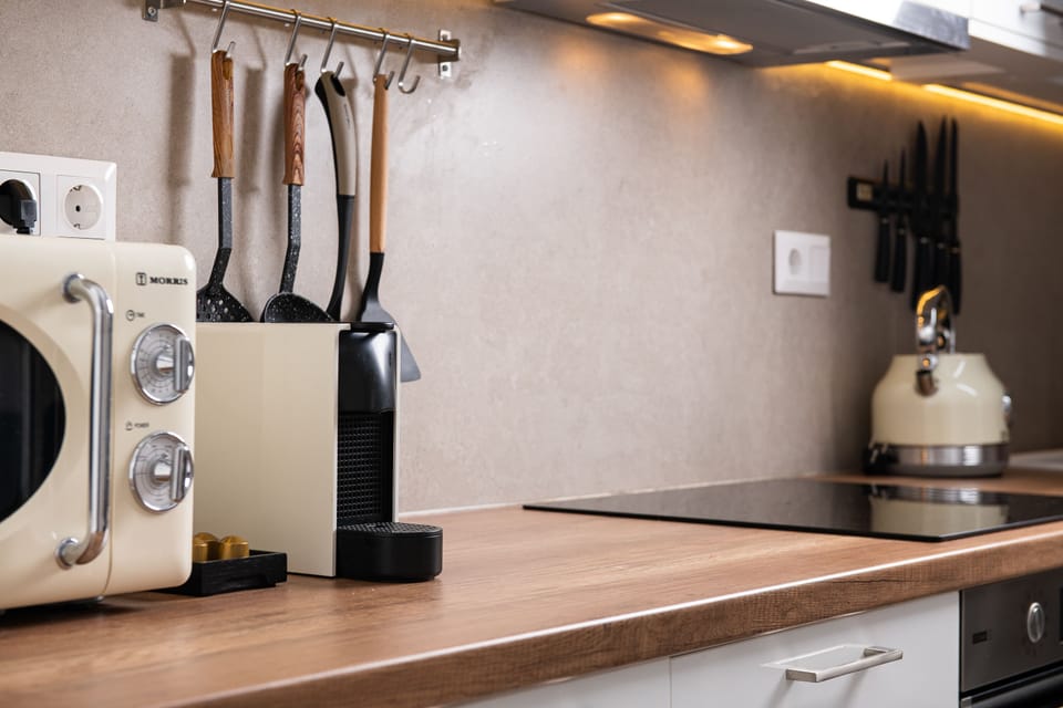 Comfort Villa | Private kitchen | Espresso maker, coffee/tea maker, full-size fridge, oven