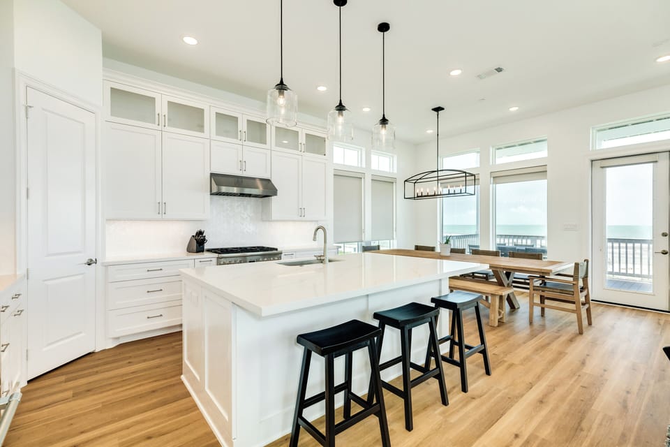 Large kitchen island is great for serving or preparing meals