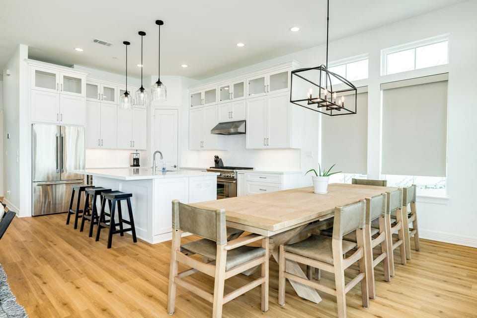 Easily serve meals from the adjacent kitchen area