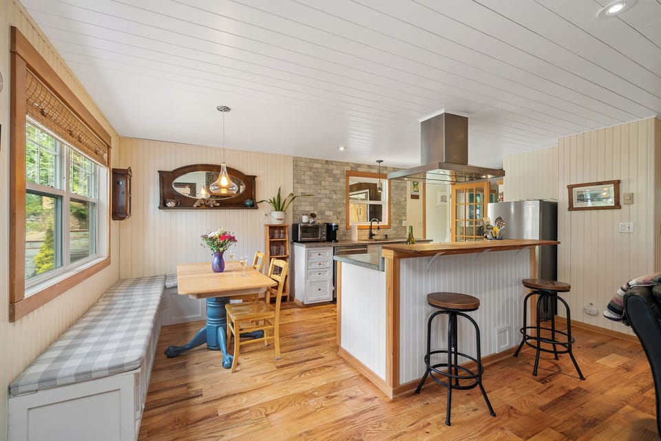 Fully equipped kitchen with Gas stove, Dishwasher, Microwave, Kuerig coffee maker, open to the living and dining area.