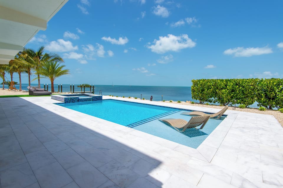 Large pool overlooking the ocean view with heater/chiller for all year access!