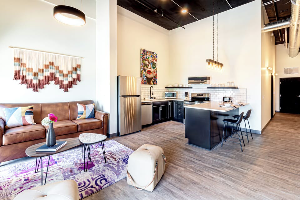 Deluxe Suite | Private kitchen | Coffee/tea maker, full-size fridge, microwave, oven