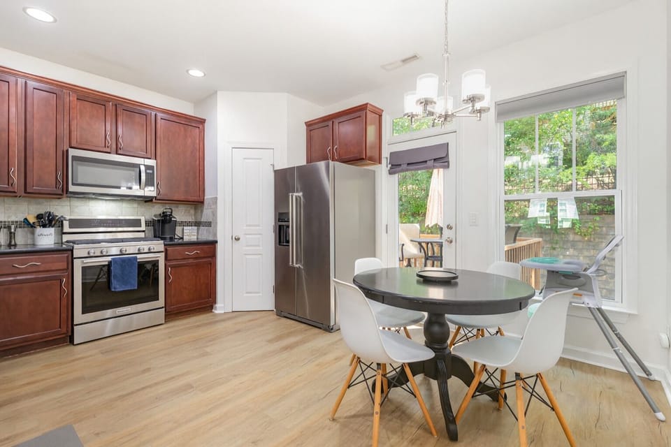 Well stocked large kitchen with full sized pantry and eat in seating.