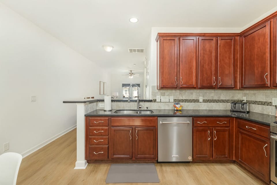 Well stocked large kitchen with full sized pantry and eat in seating.
