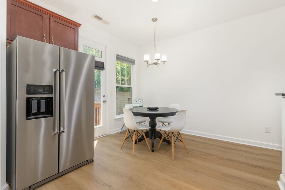 Well stocked large kitchen with full sized pantry and eat in seating.