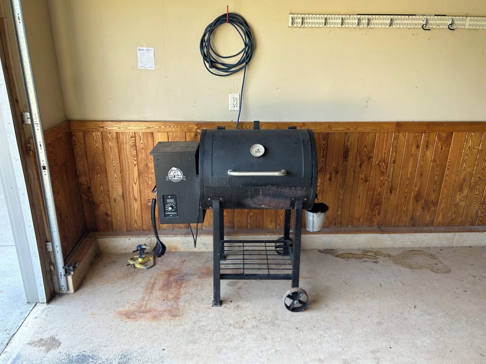 Pellet grill. Roll out side for grilling your favorites. We supply pellets.