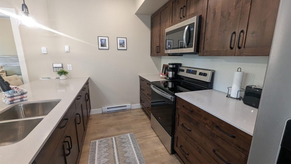 Condo, 2 Bedrooms | Private kitchen | Coffee/tea maker, fridge, oven, toaster