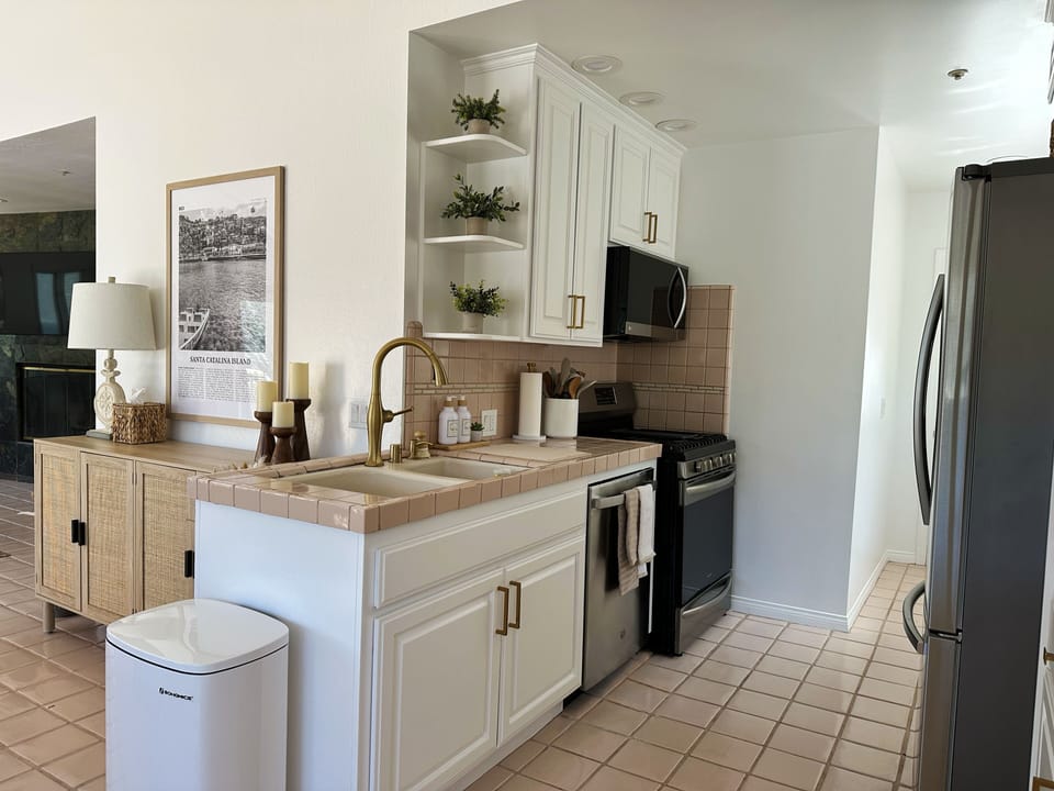 Enjoy a newly updated kitchen seamlessly merging with the inviting living area