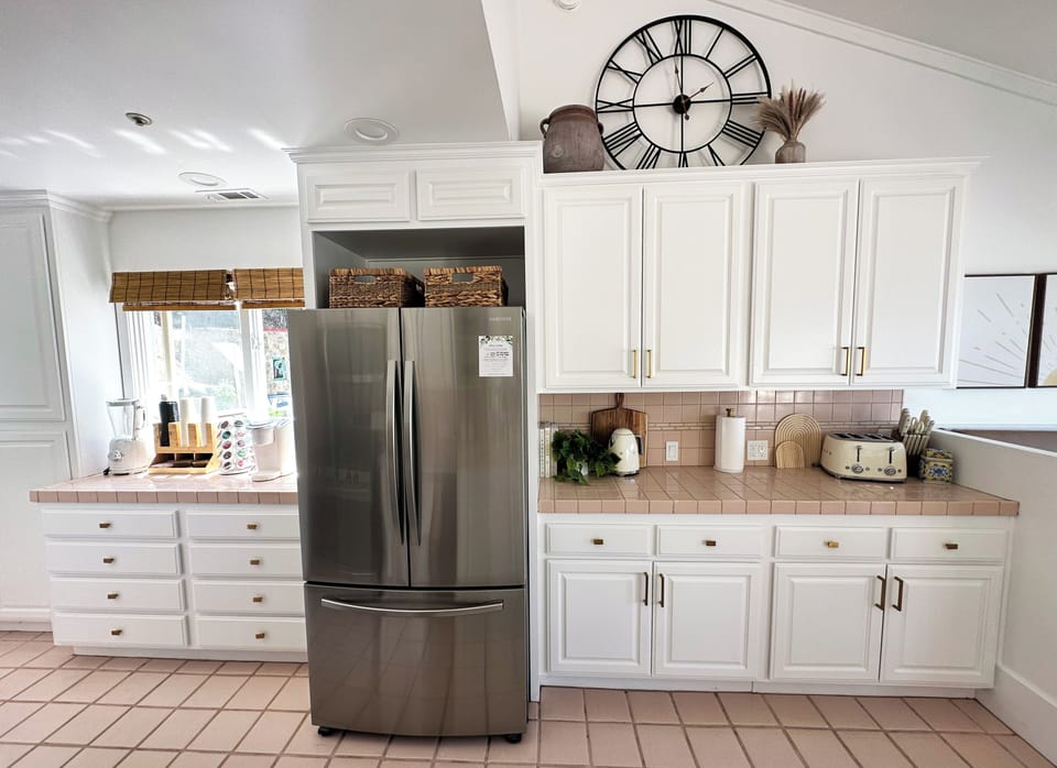 Unleash the inner chef in our fully-equipped kitchen, featuring sleek appliances