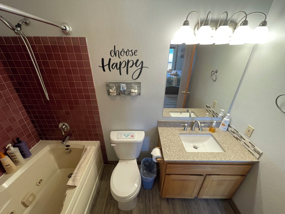Basic Triple Room, Non Smoking, Lake View | Bathroom | Combined shower/tub, jetted tub, hair dryer, towels