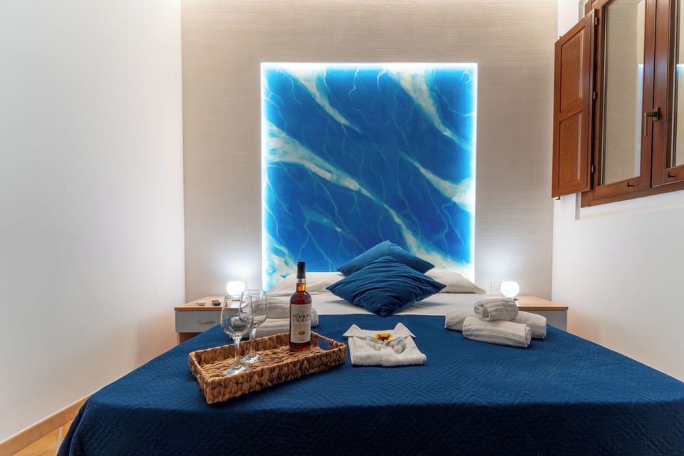 Basic Quadruple Room (Azzurra) | Free WiFi