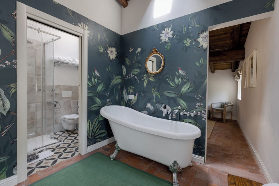 Superior Double Room, 1 Queen Bed | Bathroom | Shower, rainfall showerhead, hair dryer, bathrobes
