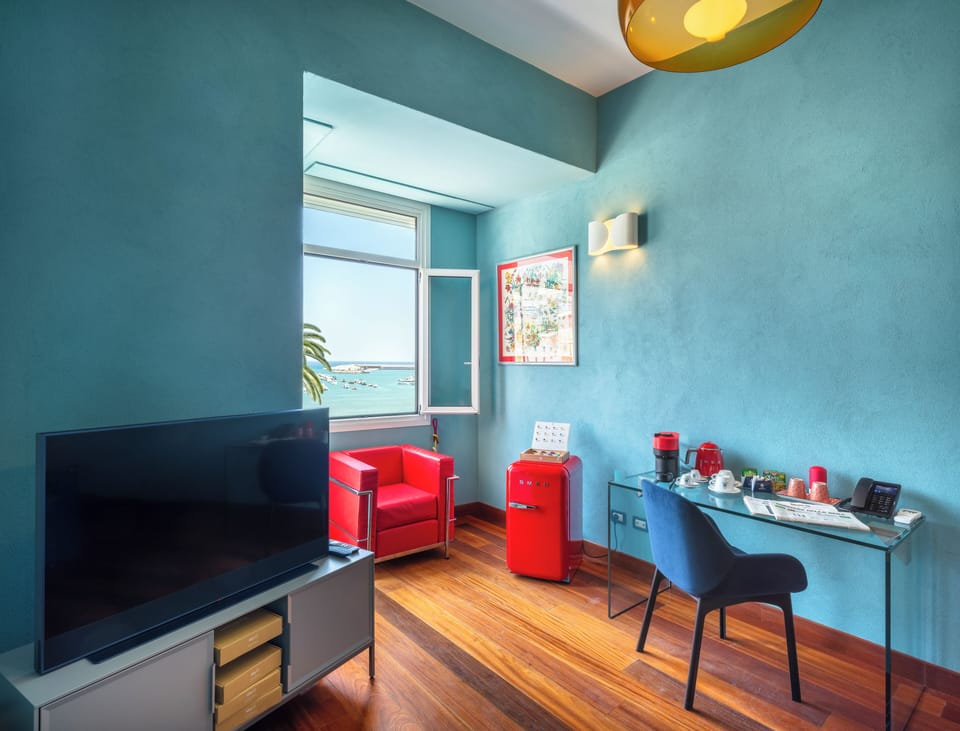 Junior Suite | Living area | 30-inch Smart TV with satellite channels