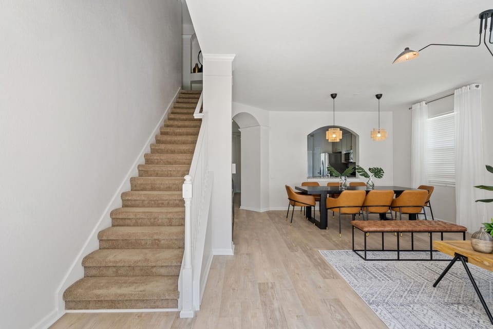 Step into our foyer with views of the spacious living and elegant dining areas.