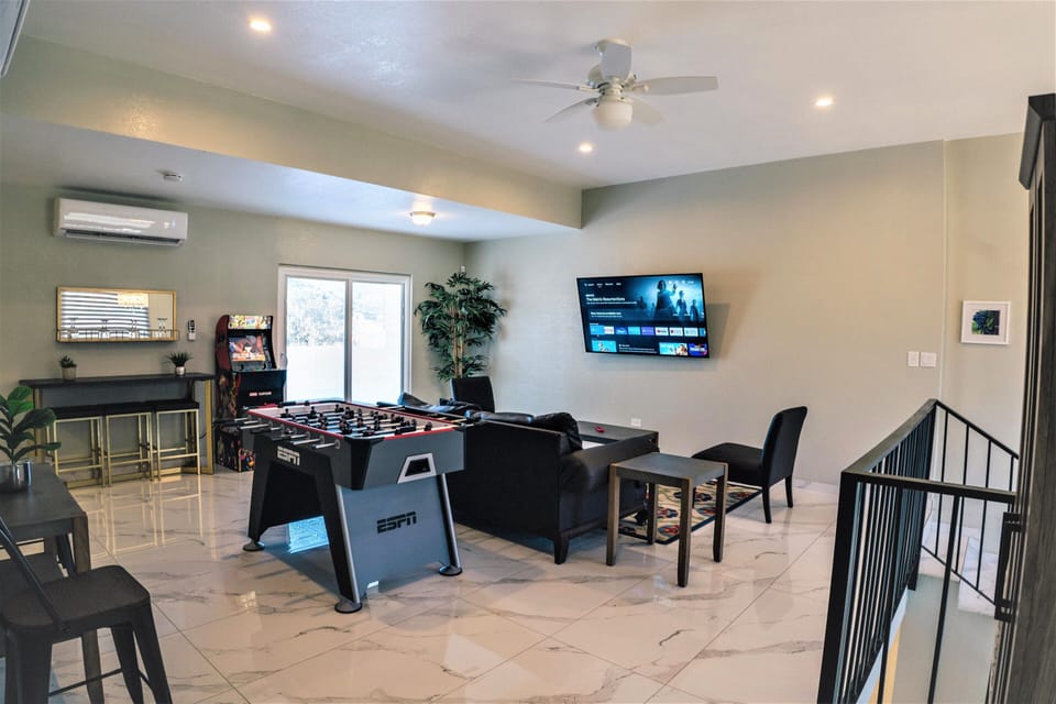Family Townhome | Living area | Computer monitors