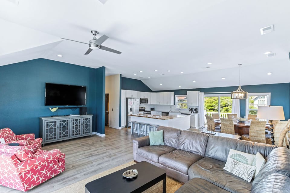 Living Room - Perfect for unwinding the coastal view, large leather sectional, Smart TV with swivel accent chairs are just a few of the many reasons to cozy up with the family.