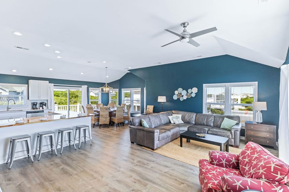 Living Area Overview - Perfect for unwinding the coastal view, large leather sectional, Smart TV with swivel accent chairs are just a few of the many reasons to cozy up with the family.