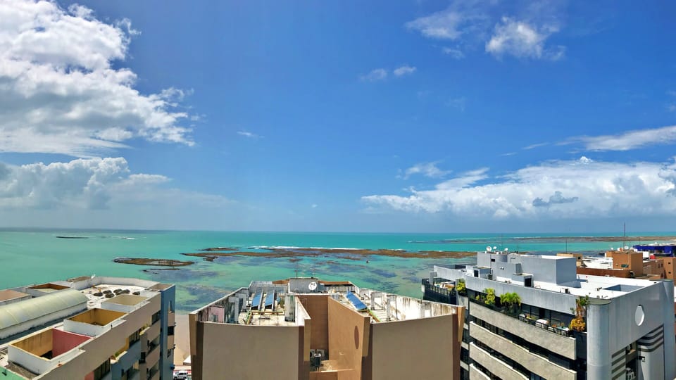 Beach nearby, white sand, 5 beach bars