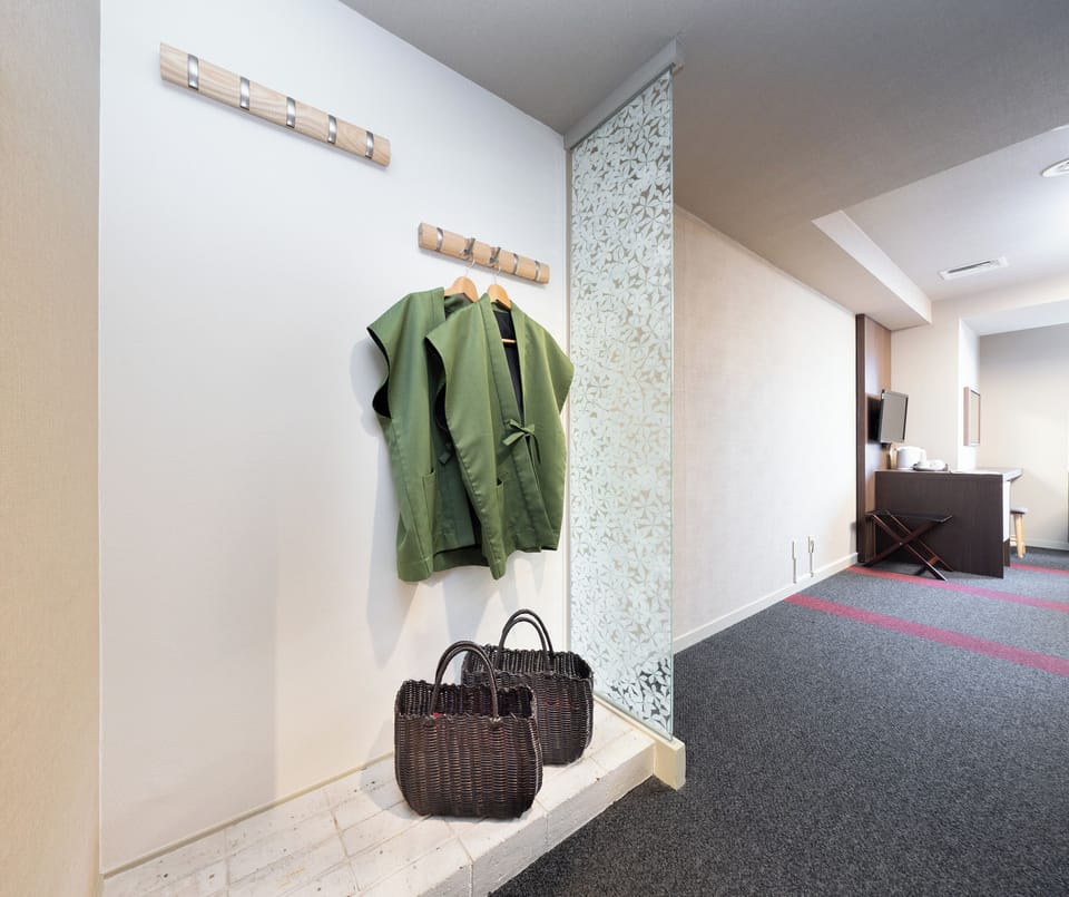 Economy Twin Room, Non Smoking | Down comforters, in-room safe, iron/ironing board (on request)