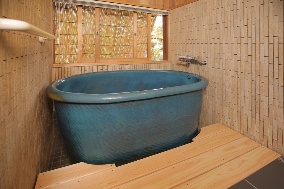 Deluxe Room (Japanese-Style, Kibi) | Bathroom | Hair dryer, slippers, electronic bidet, towels