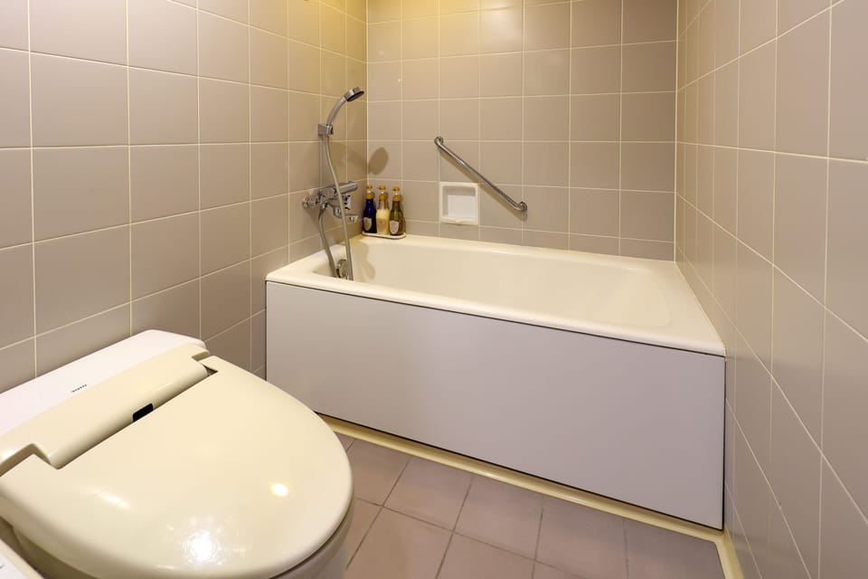 Japanese Western Style Room, Non Smoking | Bathroom | Free toiletries, hair dryer, slippers, towels