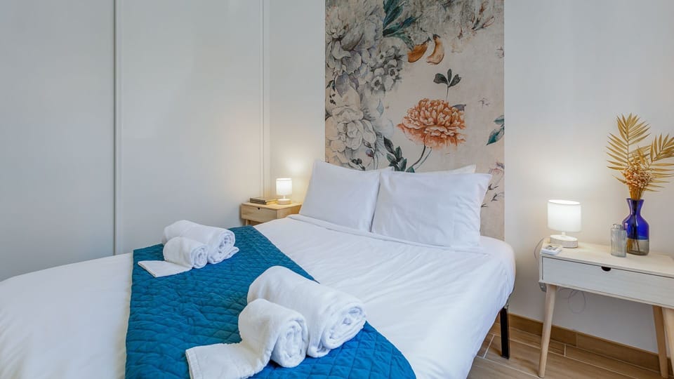 Drift into peaceful slumber in this cozy bedroom, featuring a comfortable bed and a beautiful floral accent wall.
#Bedroom #ComfortableStay #LovelyStay
