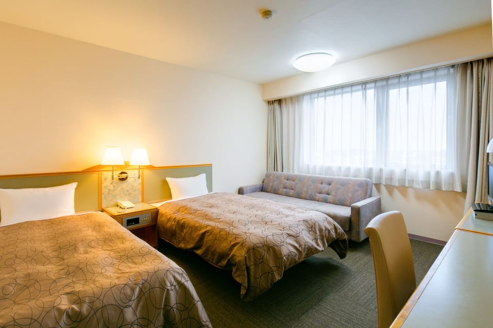 Twin Room with 1 Sofa Bed, Smoking | Free WiFi, bed sheets