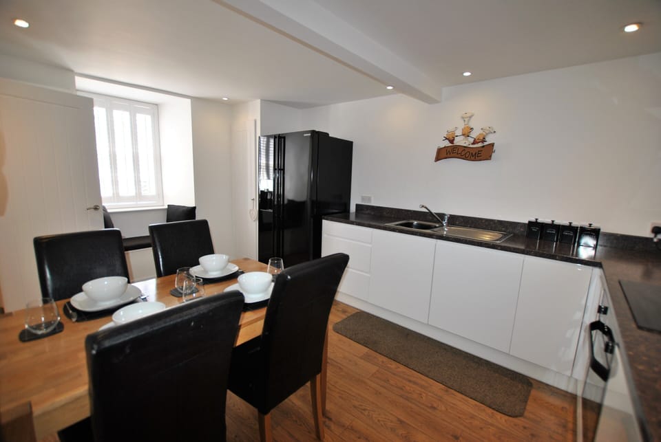 The bright dining kitchen has plenty room to cook and dine