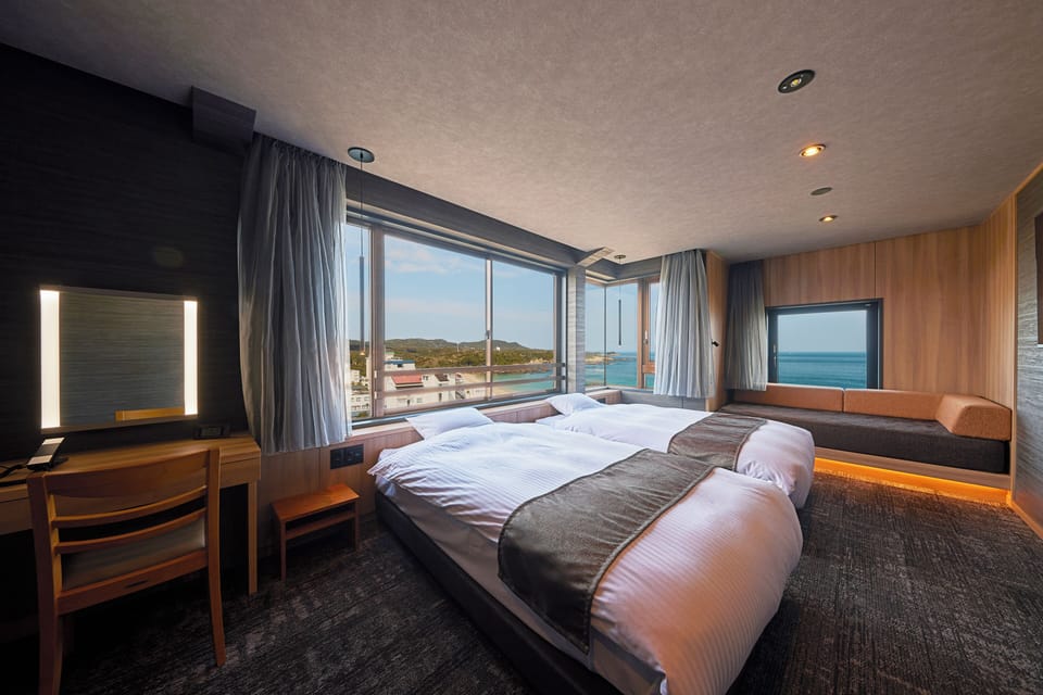 Deluxe Suite, Ocean View | In-room safe, desk, free WiFi, bed sheets