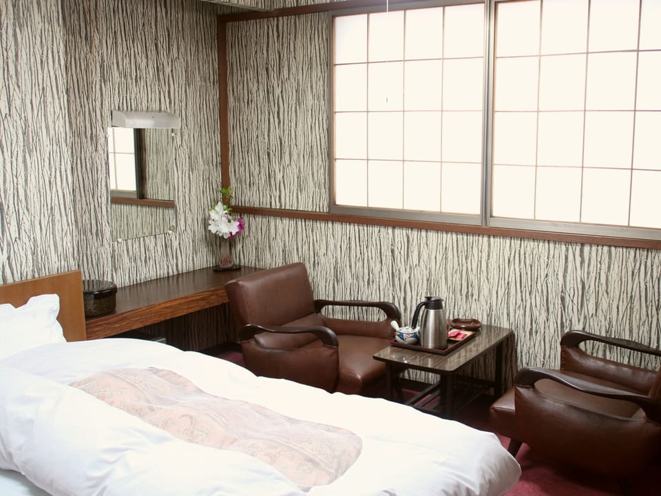Japanese Style with Private Bathroom | In-room safe, desk, laptop workspace, blackout drapes