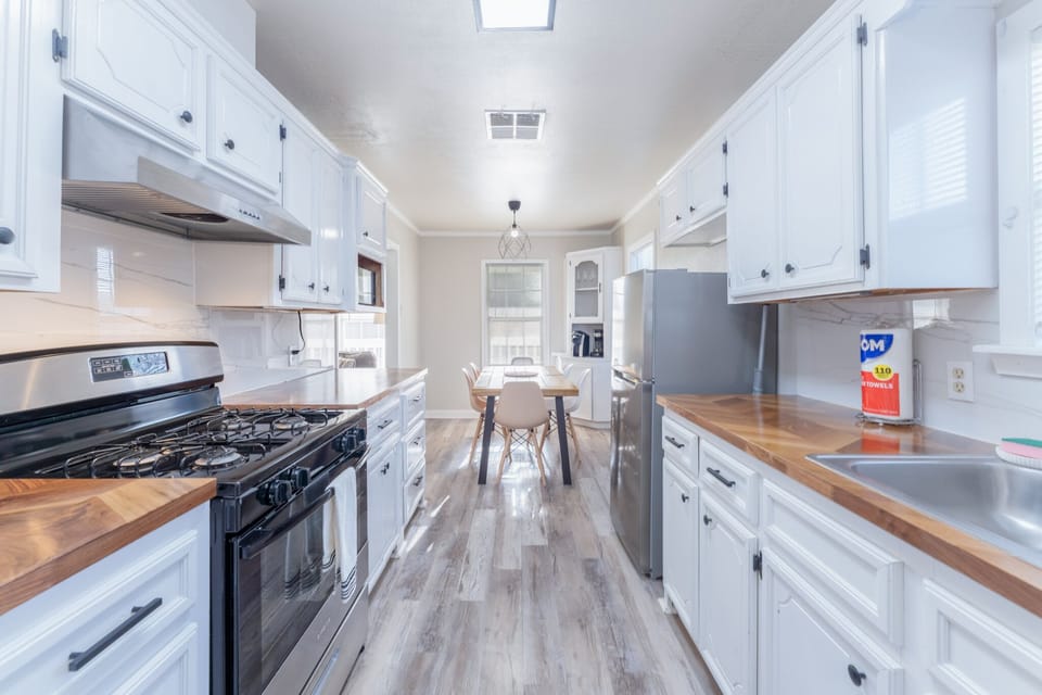 Spacious kitchen ideal for everyday meals and special occasions, featuring ample counter space and modern amenities to inspire your culinary creations.
