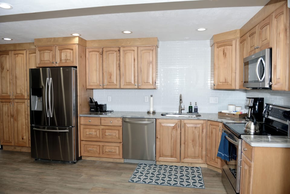 Traveling with another family? The Basement offers another fully stocked kitchen