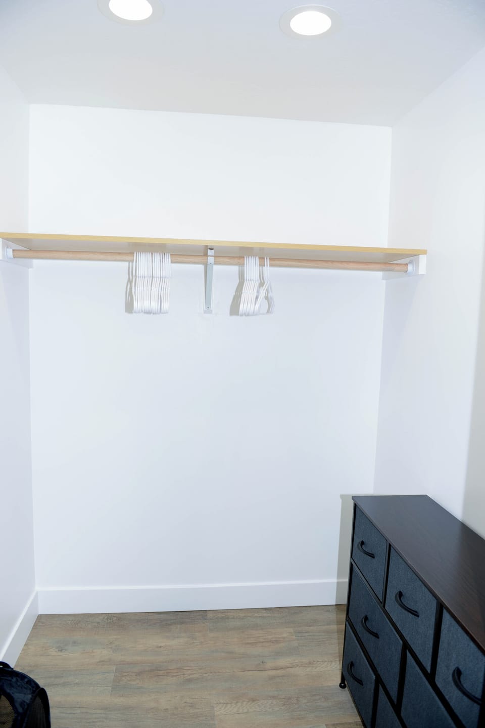 The Basement primary bedroom walk-in closet