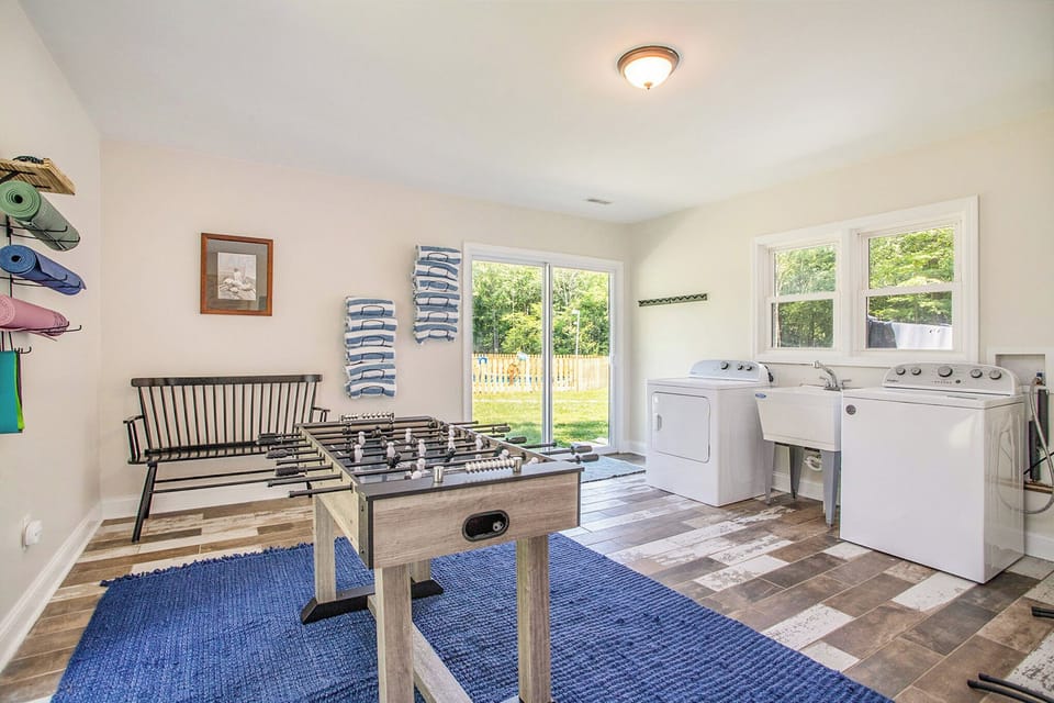 Amplify your fun in our laundry room, uniquely housing a thrilling foosball table.