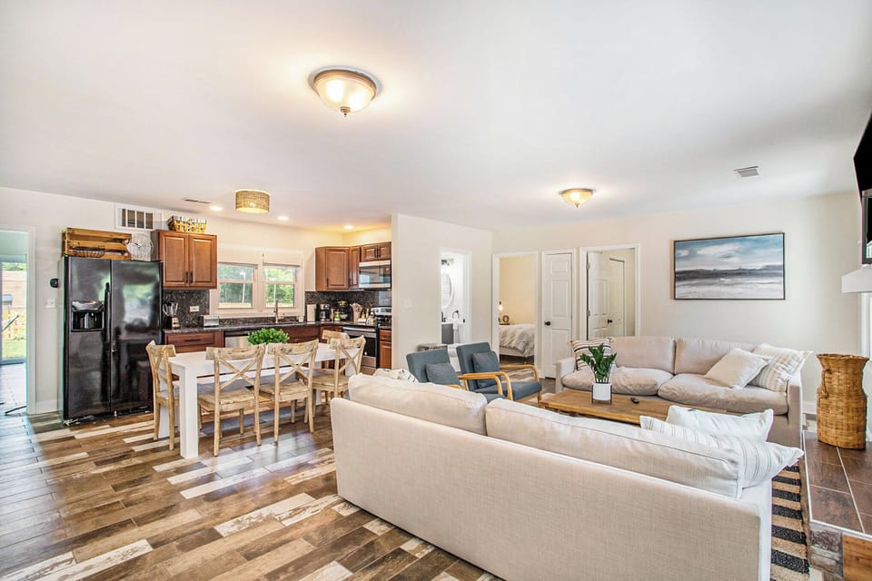 The spacious living area blends into the open kitchen and dining space. 