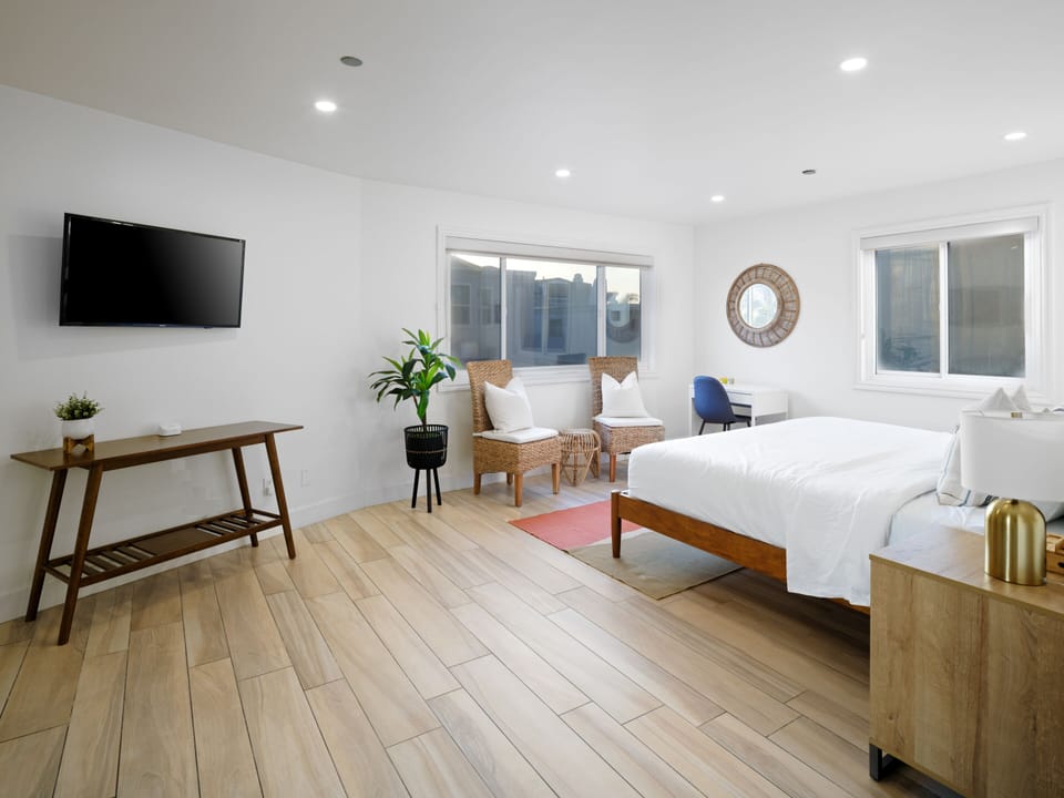 King bed, full closet, WFH desk, smart TV, and ensuite bathroom