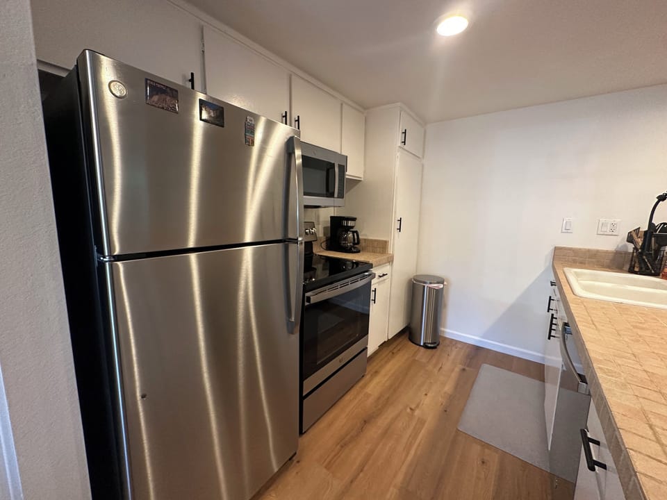 Kitchen w/ stainless steel appliances
